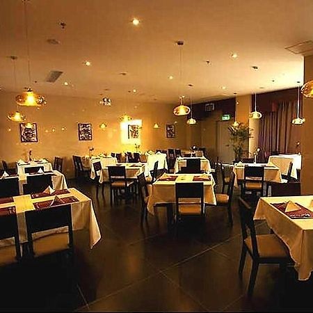 Heyi Hotel Hefei Changjiang Middle Road Екстериор снимка